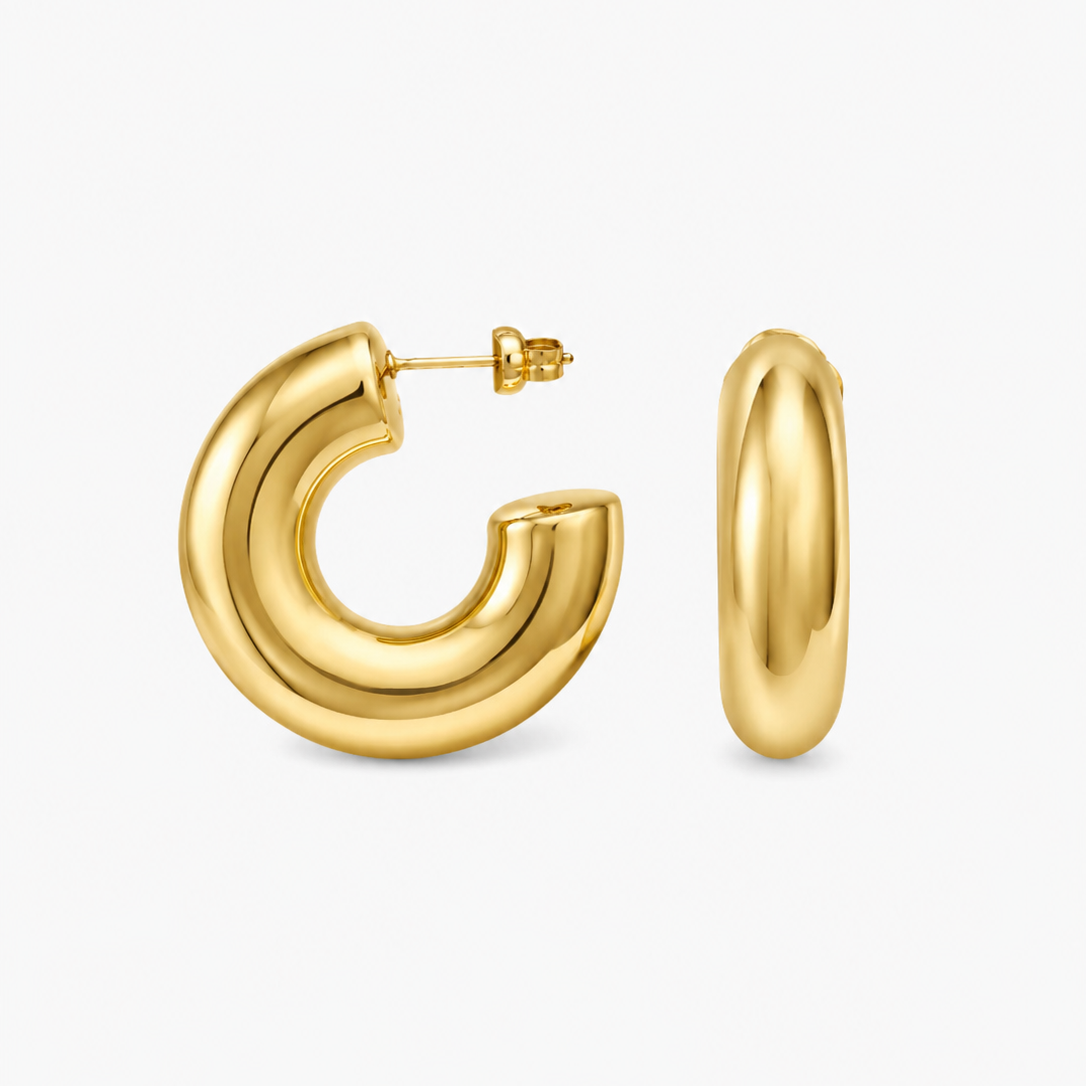 Gold plated Lady Lou Collections hoop earrings on a white background