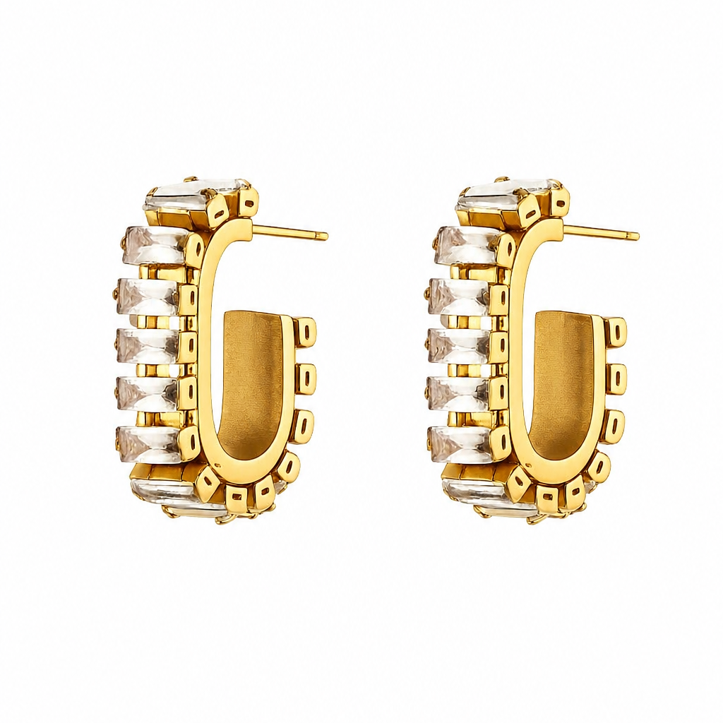 Gold plated earrings with CZ on a white background