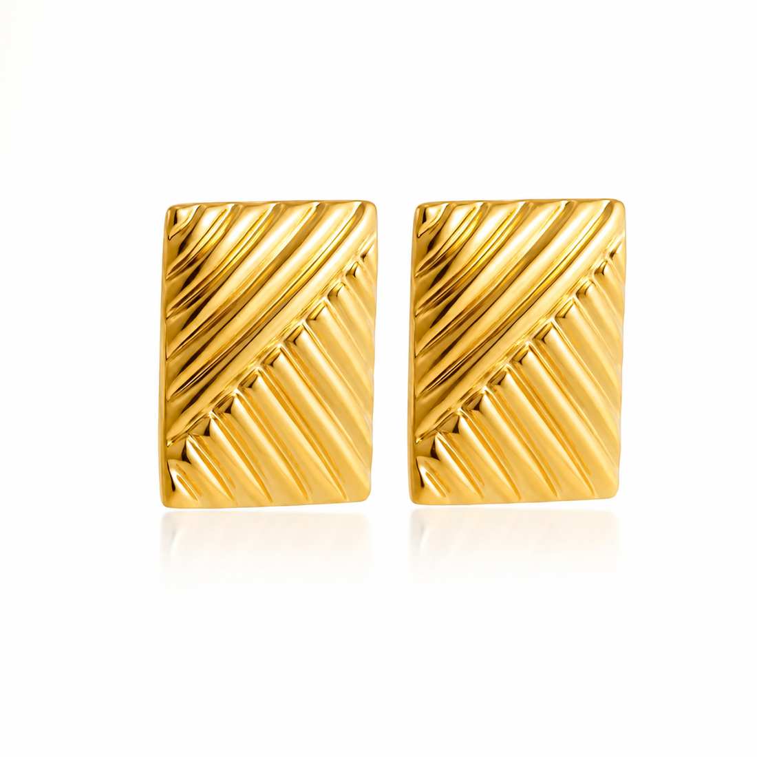 Pair of gold plated square earrings with a textured pattern on a white background
