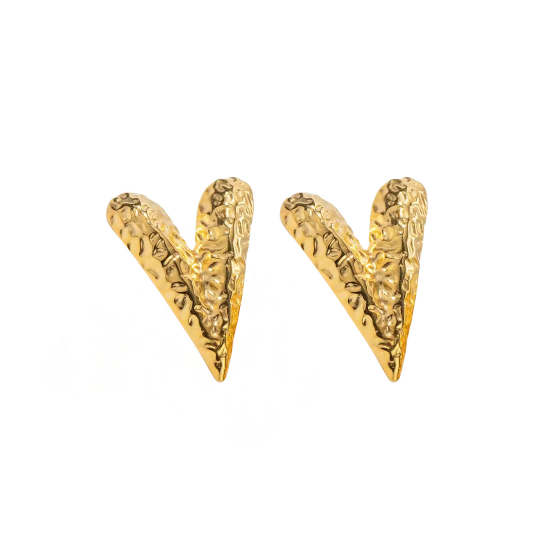 Gold plated heart earrings on white background